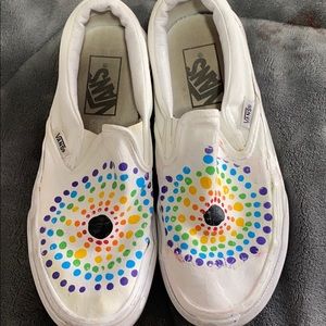 white slip on vans with paint rainbow dots